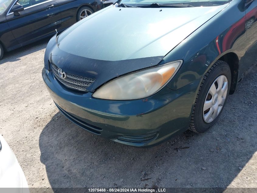 2002 Toyota Camry VIN: JTDBE32K120003941 Lot: 12075488