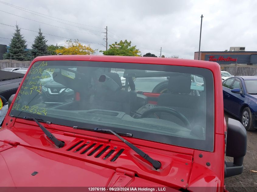 2011 Jeep Wrangler Unlimited Sahara VIN: 1J4BA5H13BL602452 Lot: 12076195