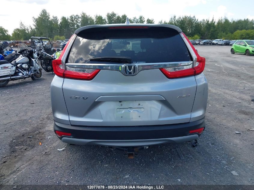 2017 Honda Cr-V Lx VIN: 2HKRW2H27HH135286 Lot: 12077079