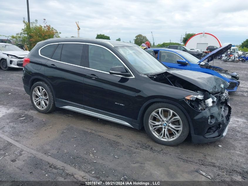 WBXHT3C35J5K30626 2018 BMW X1 - Image 1