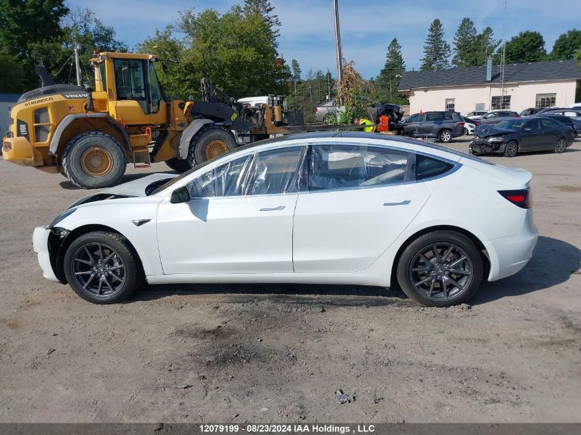 2018 Tesla Model 3 VIN: 5YJ3E1EA1JF027829 Lot: 12079199