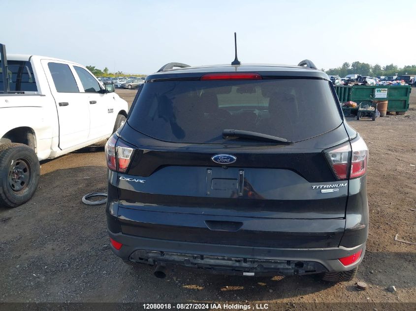 2018 Ford Escape Titanium VIN: 1FMCU9J98JUA05973 Lot: 12080018