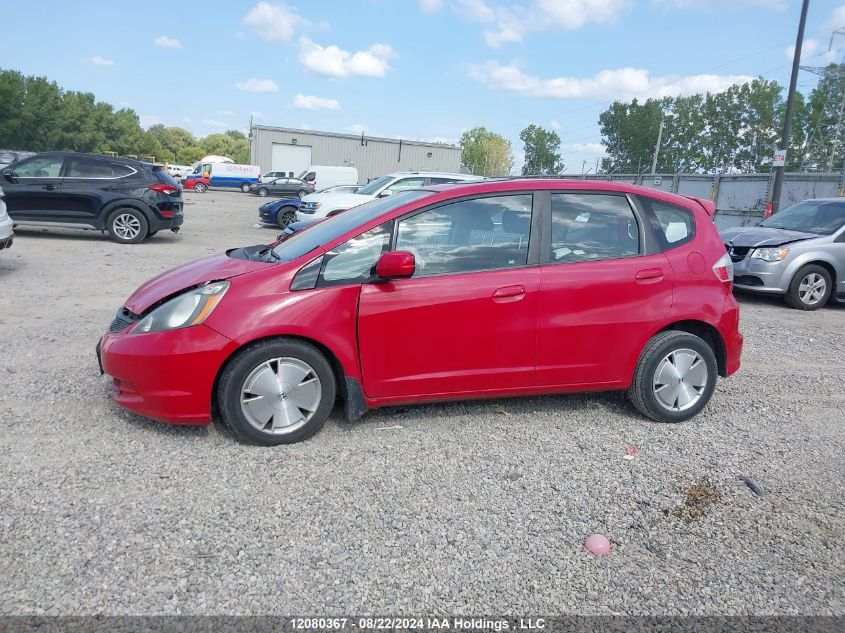 2009 Honda Fit VIN: JHMGE88599S810676 Lot: 12080367