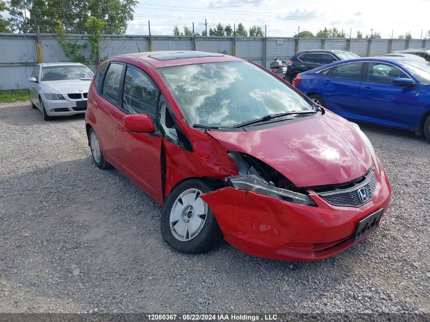 2009 Honda Fit VIN: JHMGE88599S810676 Lot: 12080367