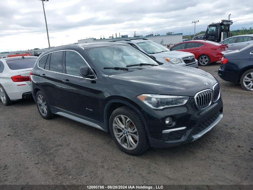 WBXHT3C38J5K23380 2018 BMW X1 - Image 1