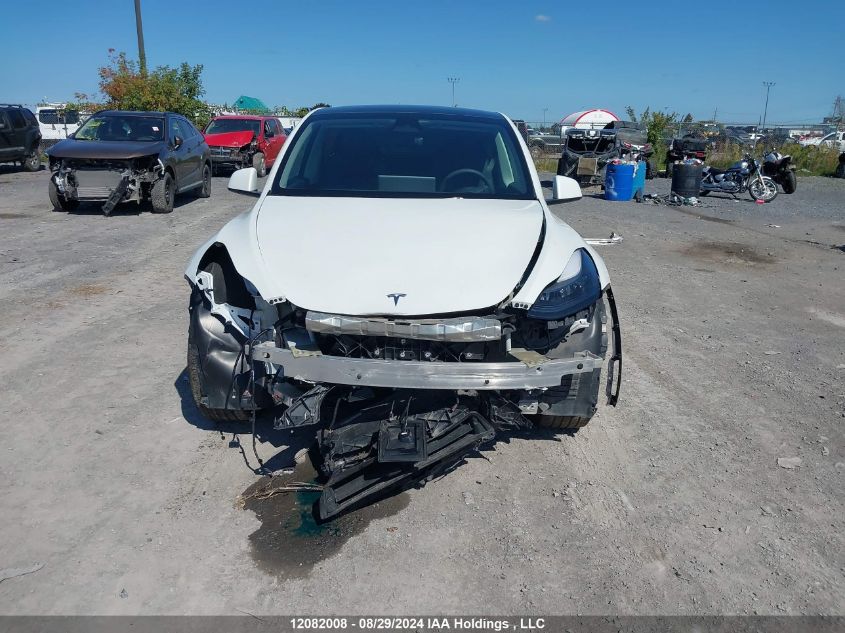 2023 Tesla Model Y VIN: 7SAYGAEE6PF762837 Lot: 12082008