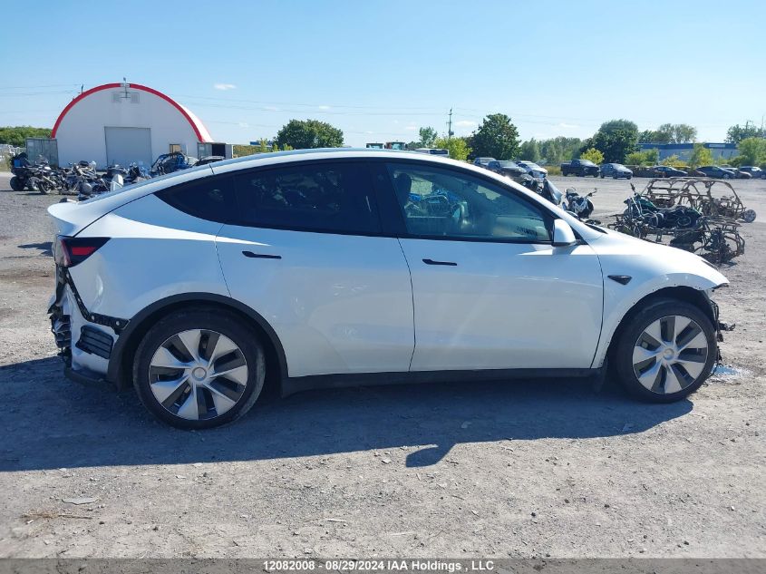 2023 Tesla Model Y VIN: 7SAYGAEE6PF762837 Lot: 12082008