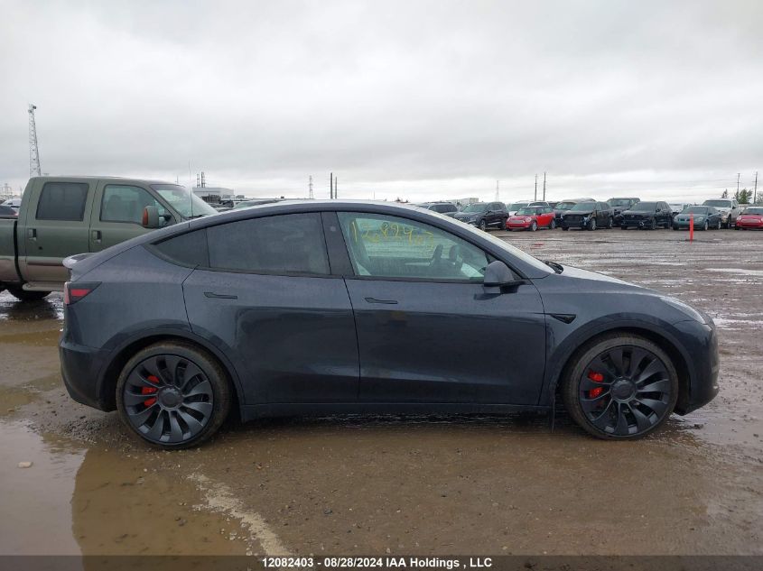 2024 Tesla Model Y VIN: 7SAYGDEF2RF107748 Lot: 12082403