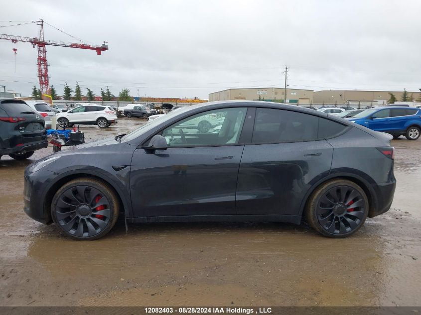 2024 Tesla Model Y VIN: 7SAYGDEF2RF107748 Lot: 12082403