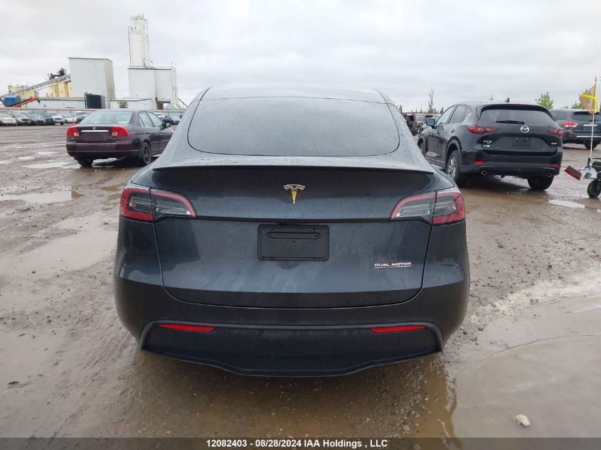 2024 Tesla Model Y VIN: 7SAYGDEF2RF107748 Lot: 12082403