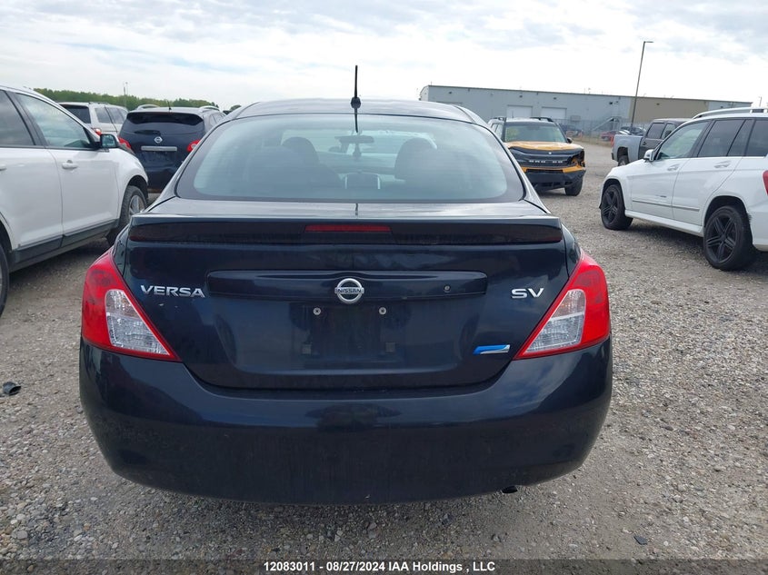 2014 Nissan Versa VIN: 3N1CN7AP7EL803050 Lot: 12083011