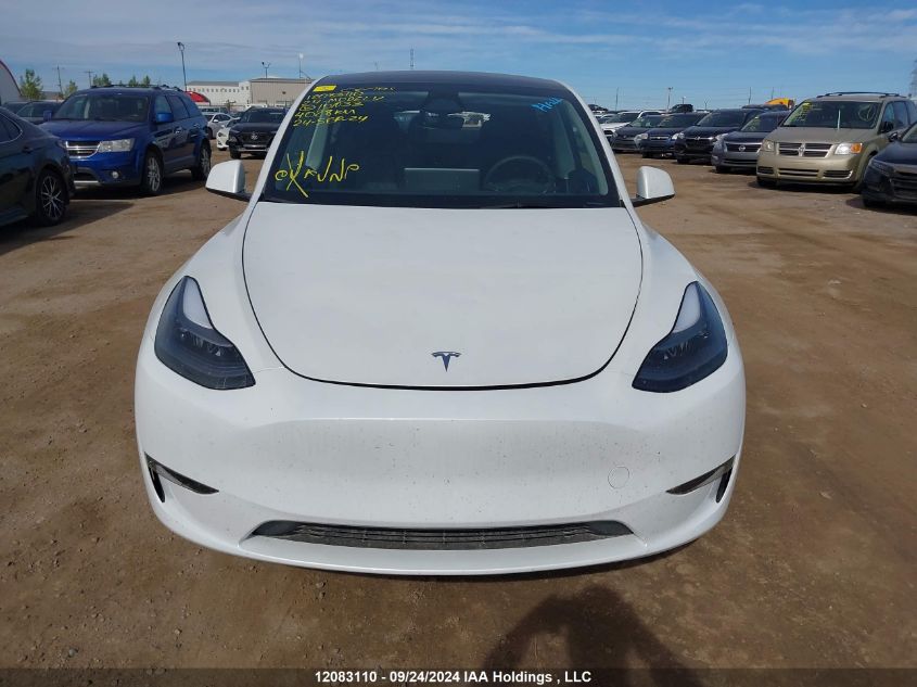 2024 Tesla Model Y VIN: 7SAYGDEE9RF101033 Lot: 12083110