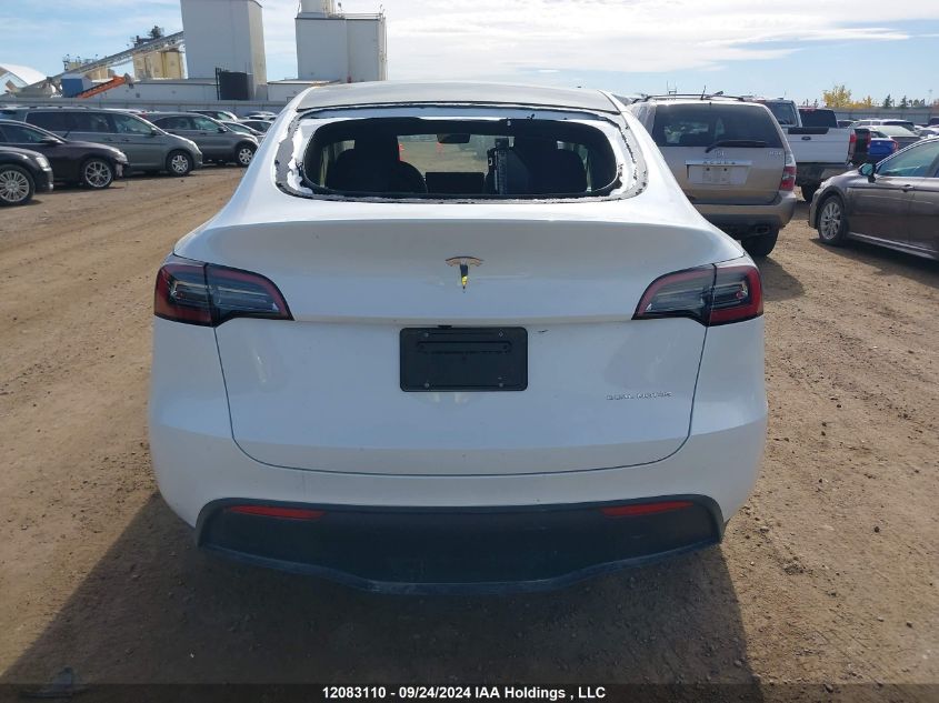 2024 Tesla Model Y VIN: 7SAYGDEE9RF101033 Lot: 12083110