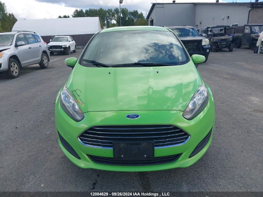 2014 Ford Fiesta VIN: 3FADP4EJ2EM140096 Lot: 12084629