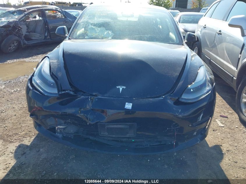 2022 Tesla Model 3 VIN: 5YJ3E1EA9NF335921 Lot: 12085644