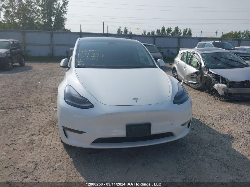 2023 Tesla Model Y VIN: 7SAYGDEE3PF774445 Lot: 12088250