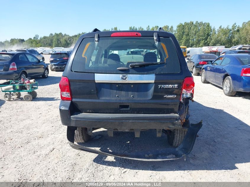 2011 Mazda Tribute VIN: 4F2CY9C73BKM04758 Lot: 12088329