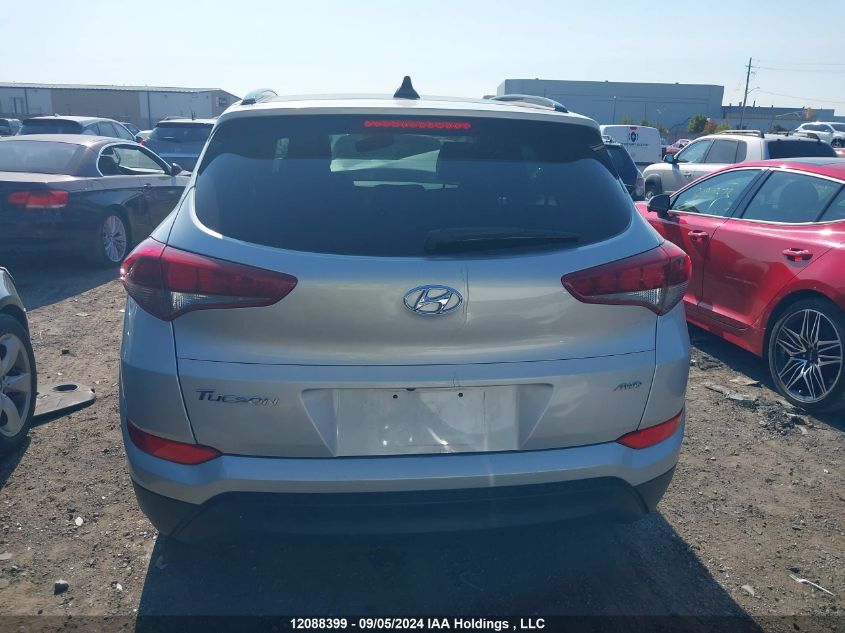 KM8J3CA46GU171543 2016 HYUNDAI TUCSON - Image 16