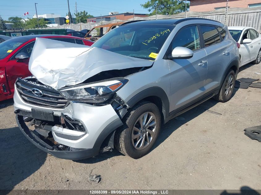 KM8J3CA46GU171543 2016 HYUNDAI TUCSON - Image 2