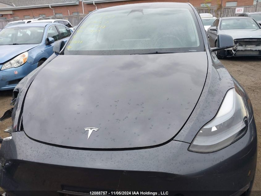 2023 Tesla Model Y VIN: LRWYGDFD0PC057868 Lot: 12088757