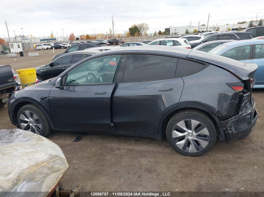 2023 Tesla Model Y VIN: LRWYGDFD0PC057868 Lot: 12088757