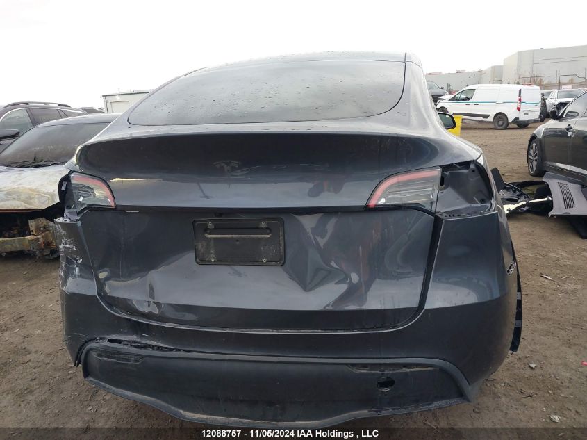 2023 Tesla Model Y VIN: LRWYGDFD0PC057868 Lot: 12088757