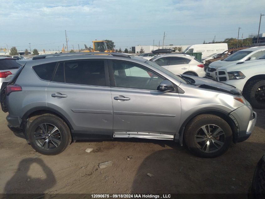 2018 Toyota Rav4 Xle VIN: 2T3RFREV9JW702281 Lot: 12090675