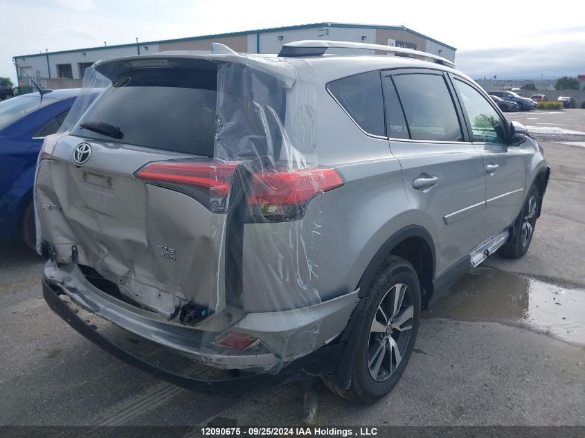 2018 Toyota Rav4 Xle VIN: 2T3RFREV9JW702281 Lot: 12090675