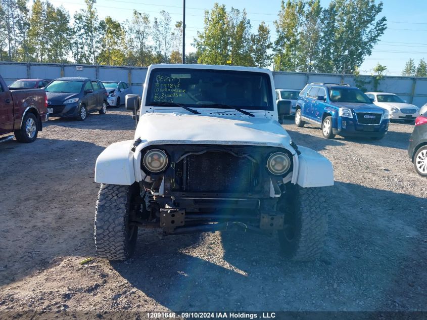 2010 Jeep Wrangler Unlimited Sahara VIN: 1J4BA5H15AL210605 Lot: 12091846