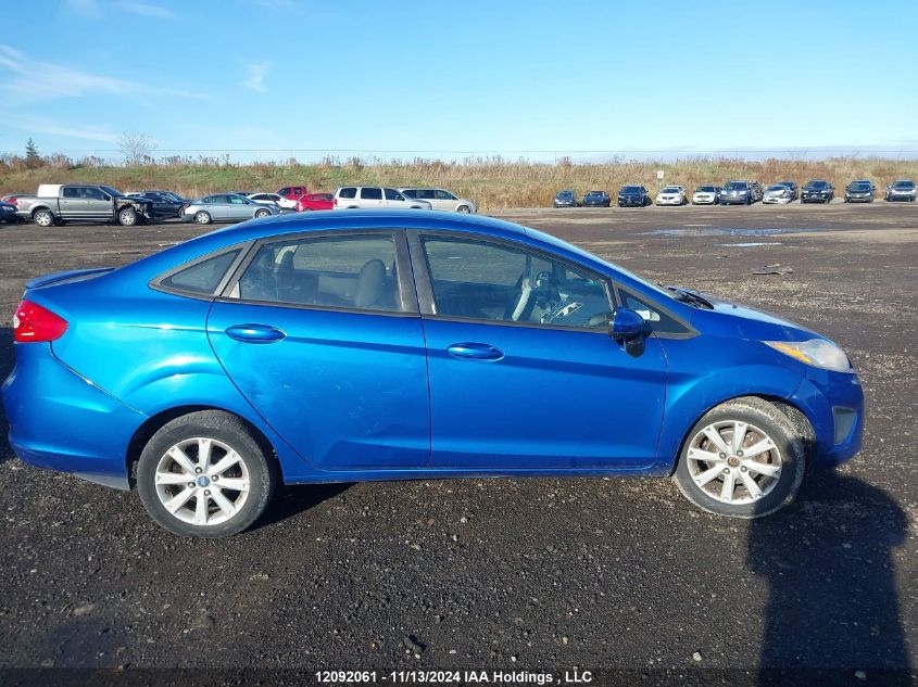 2011 Ford Fiesta VIN: 3FADP4BJ7BM104887 Lot: 12092061