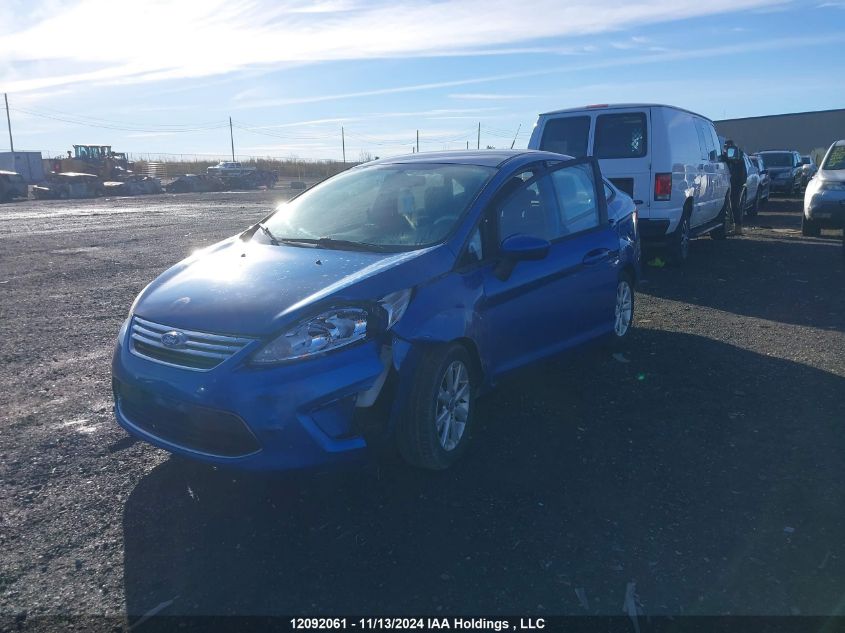 2011 Ford Fiesta VIN: 3FADP4BJ7BM104887 Lot: 12092061