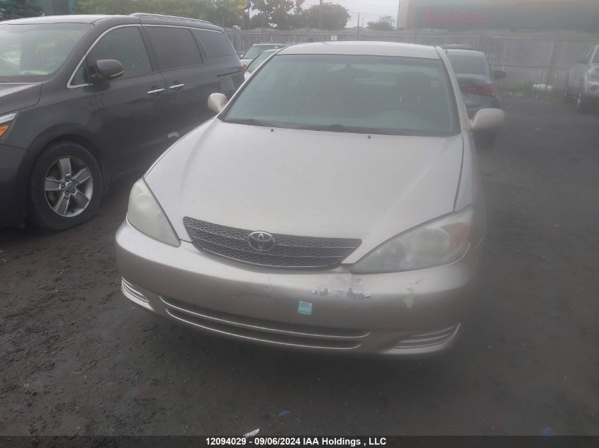 2004 Toyota Camry Le/Se/Xle VIN: 4T1BE32KX4U869578 Lot: 12094029