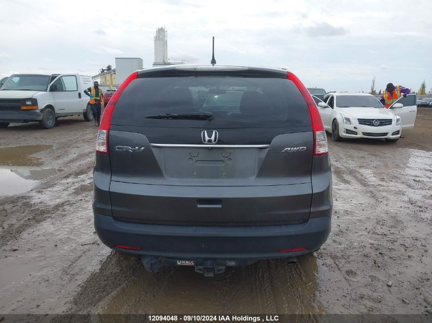 2014 Honda Cr-V VIN: 2HKRM4H30EH111630 Lot: 12094048