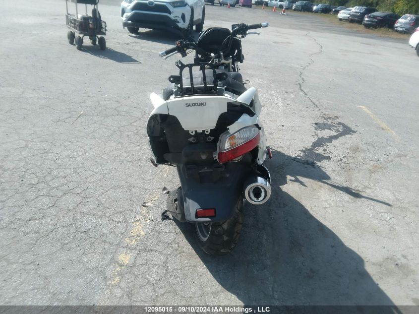 2012 Suzuki An650 A VIN: JS1CP51B5C2100264 Lot: 12095015