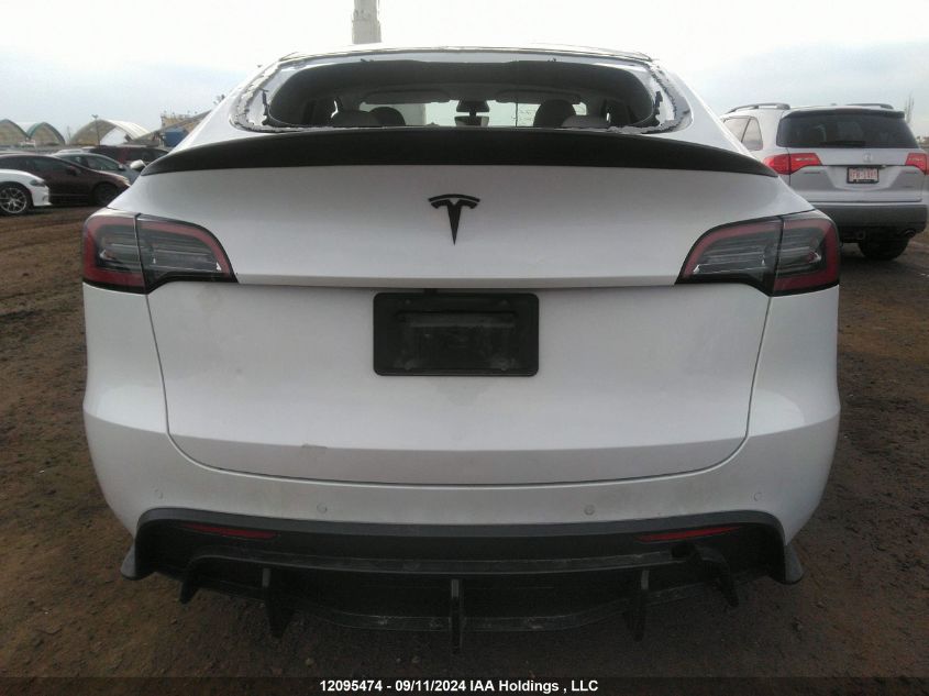 2021 Tesla Model Y VIN: 5YJYGDEE9MF276498 Lot: 12095474