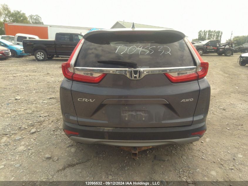 2018 Honda Cr-V VIN: 2HKRW2H23JH149191 Lot: 12095532
