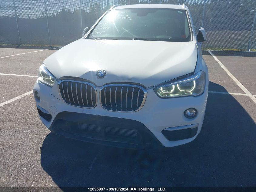 2018 BMW X1 VIN: WBXHT3C33J5F92280 Lot: 12095997