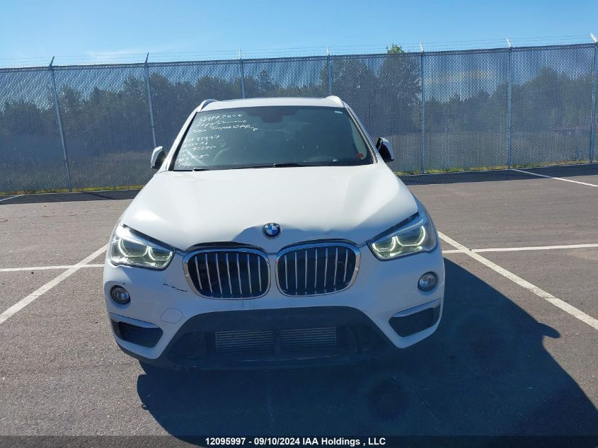 2018 BMW X1 VIN: WBXHT3C33J5F92280 Lot: 12095997