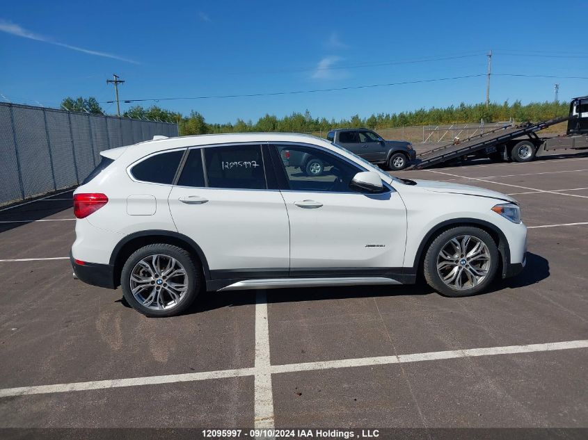 2018 BMW X1 VIN: WBXHT3C33J5F92280 Lot: 12095997