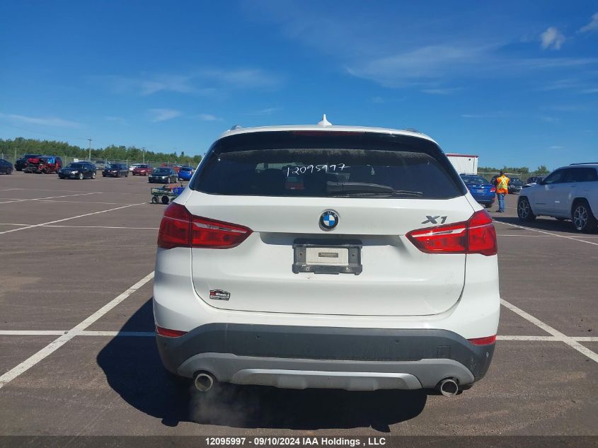 2018 BMW X1 VIN: WBXHT3C33J5F92280 Lot: 12095997