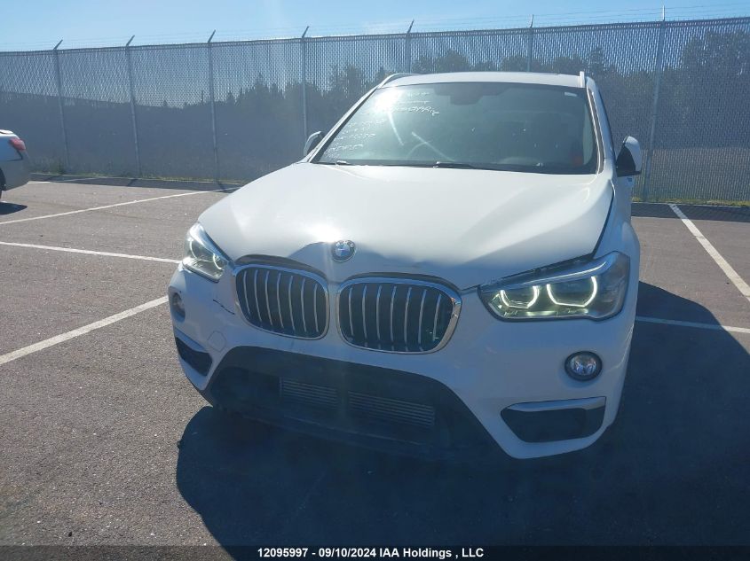 2018 BMW X1 VIN: WBXHT3C33J5F92280 Lot: 12095997