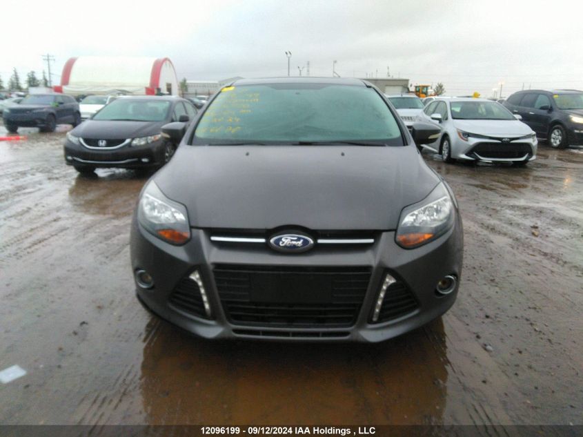 2013 Ford Focus Titanium VIN: 1FADP3J24DL238720 Lot: 12096199