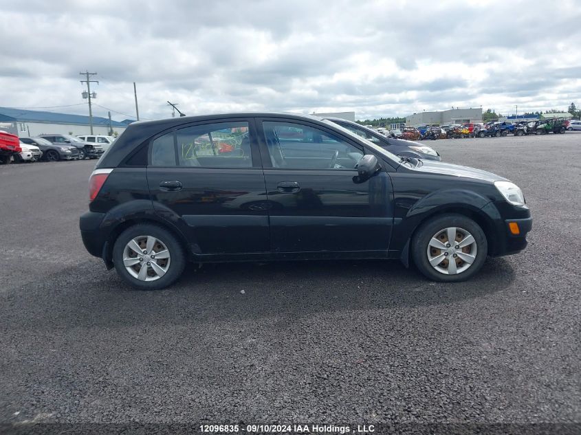 2009 Kia Rio VIN: KNADE243296453319 Lot: 12096835