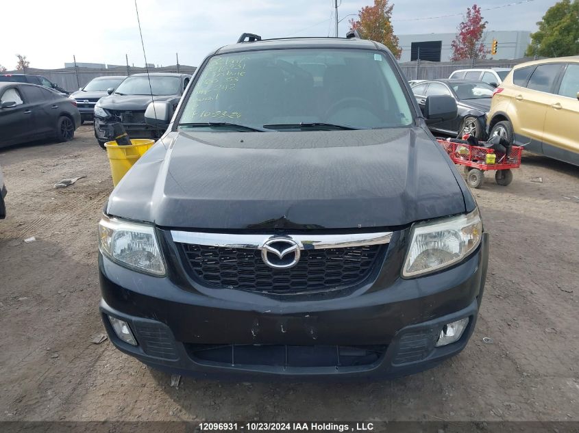 2011 Mazda Tribute VIN: 4F2CY0C77BKM00353 Lot: 12096931