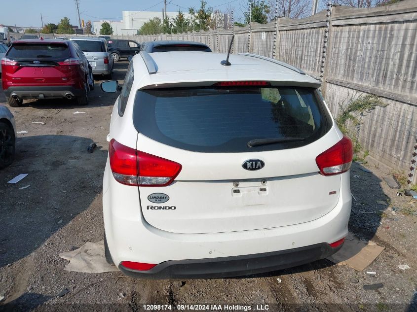 2014 Kia Rondo VIN: KNAHT8A31E7064769 Lot: 12098174