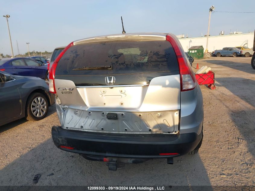 2014 Honda Cr-V VIN: 2HKRM3H34EH000704 Lot: 12099303