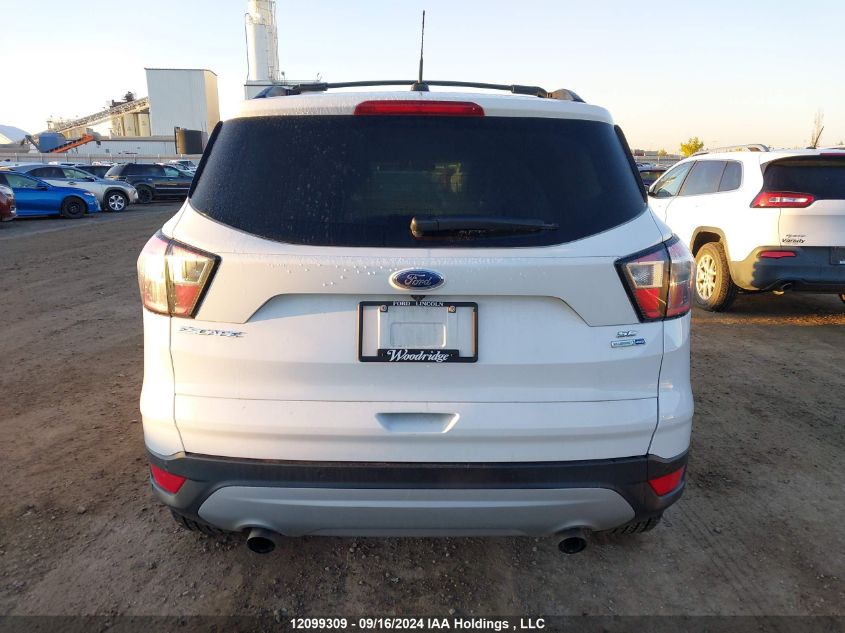 2017 Ford Escape Se VIN: 1FMCU9G93HUB68693 Lot: 12099309