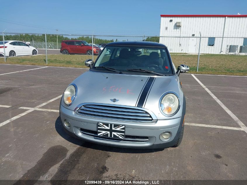 2007 Mini Cooper Hardtop VIN: WMWMF33597TT56204 Lot: 12099439