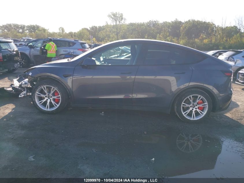 2022 Tesla Model Y VIN: 7SAYGDEF3NF563199 Lot: 12099970