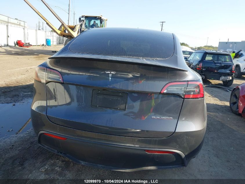 2022 Tesla Model Y VIN: 7SAYGDEF3NF563199 Lot: 12099970